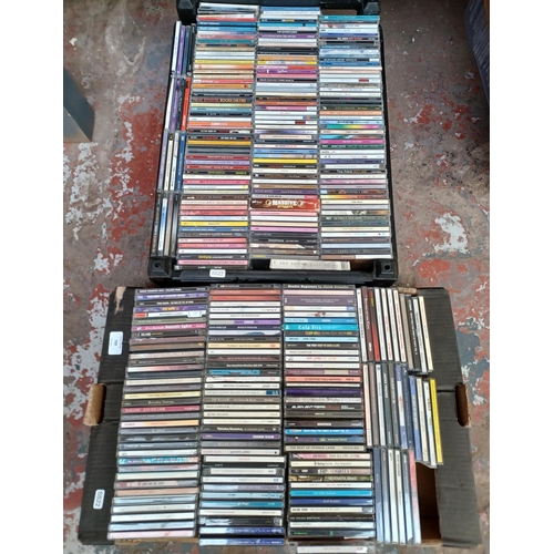 769 - Two boxes containing a collection of CDs - see images for titles