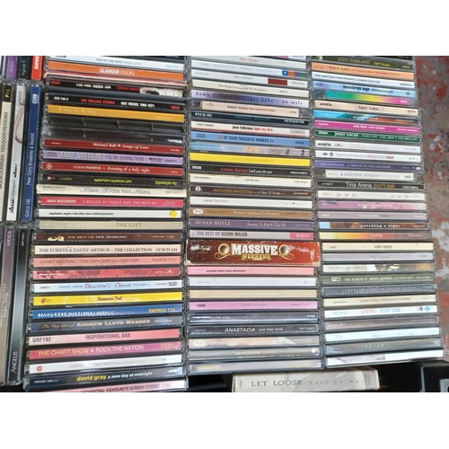 769 - Two boxes containing a collection of CDs - see images for titles