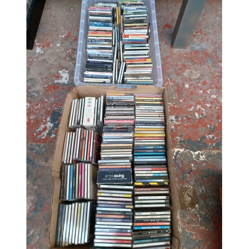 770 - Two boxes containing a collection of CDs - see images for titles