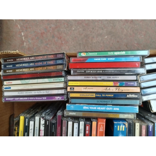 771 - Two boxes containing a collection of CDs - see images for titles