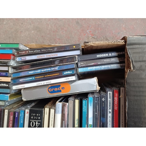 771 - Two boxes containing a collection of CDs - see images for titles