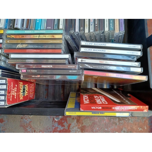 774 - Two boxes containing a collection of CDs - see images for titles