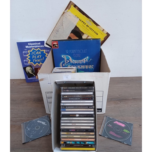 775 - A box containing a collection of LP vinyl records and CDs - see images for titles