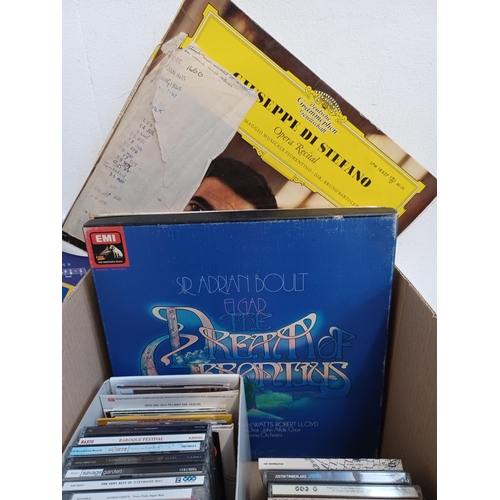 775 - A box containing a collection of LP vinyl records and CDs - see images for titles