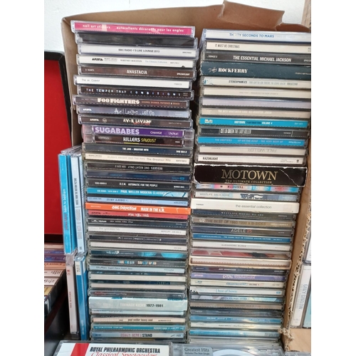 776 - Two boxes and a storage case containing a collection of CDs and compact cassettes - see images for t... 