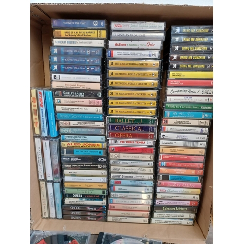 776 - Two boxes and a storage case containing a collection of CDs and compact cassettes - see images for t... 