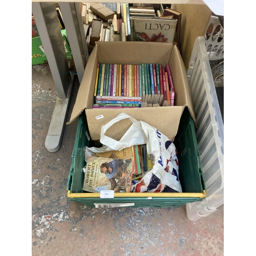 884 - A box containing Ladybird and Mills & Boon books