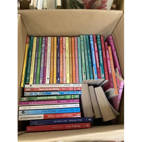 884 - A box containing Ladybird and Mills & Boon books