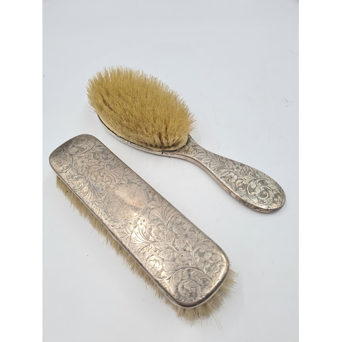 1267 - Two antique white metal backed brushes