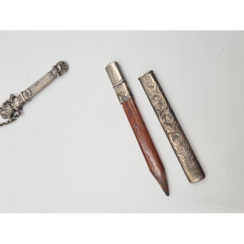 1274 - Two pieces of hallmarked Birmingham silver, one Edwardian pencil holder dated 1908 and one Victorian... 