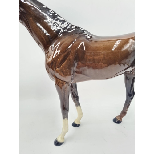 195 - A Beswick horse figurine - approx. 28cm high x 36cm long