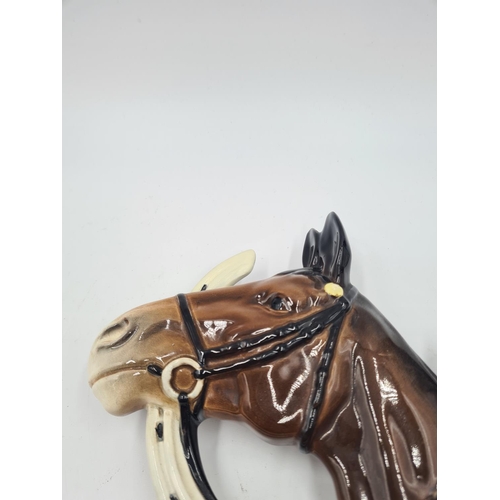 197 - A Beswick horse wall plaque, model no. 806 - approx. 17cm high x 18cm wide