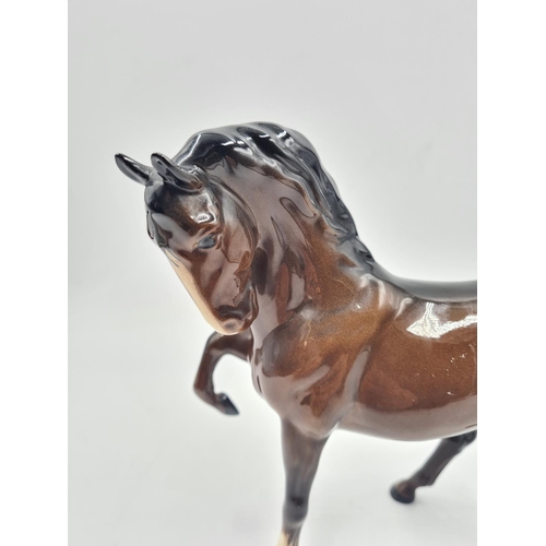 199 - A Beswick horse figurine - approx. 19cm high x 20cm long