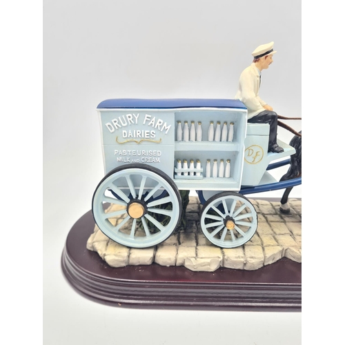 200 - A Leonardo Collection Drury Farm Dairies horse and cart figurine on mahogany plinth - approx. 18cm h... 