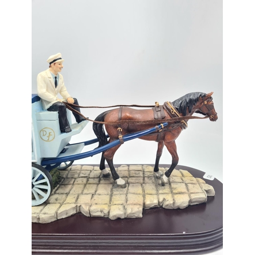 200 - A Leonardo Collection Drury Farm Dairies horse and cart figurine on mahogany plinth - approx. 18cm h... 