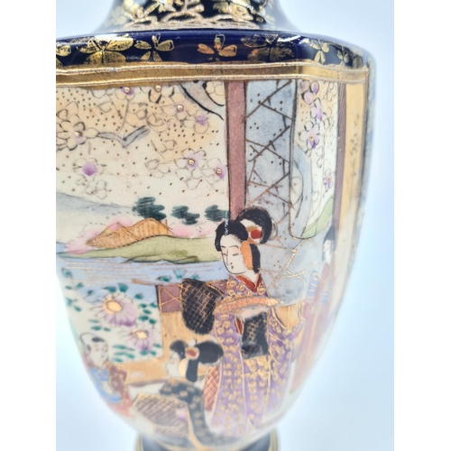 210 - A Japanese hand painted Satsuma vase - approx. 22cm high