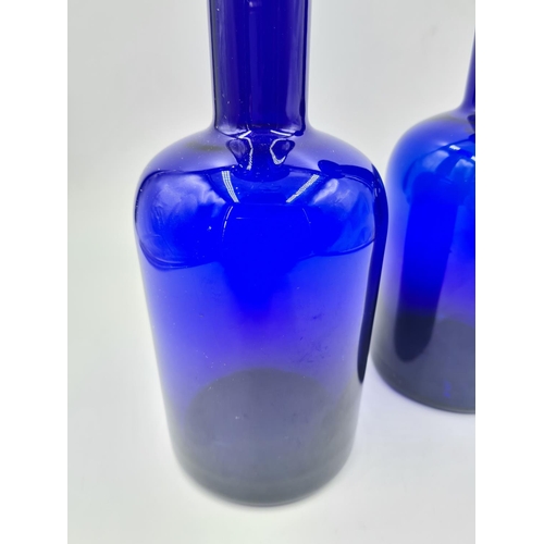 225 - A pair of 1960s Holmegaard cobalt blue glass vases - approx. 26cm high