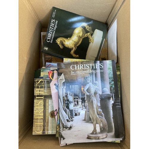 898 - Three boxes containing a large quantity of Christie's magazines and three auction catalogues