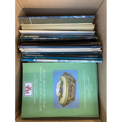 898 - Three boxes containing a large quantity of Christie's magazines and three auction catalogues