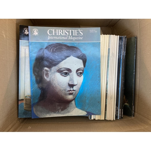 898 - Three boxes containing a large quantity of Christie's magazines and three auction catalogues