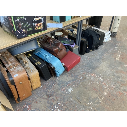 899 - A very large quantity of suitcases, travel cases and luggage