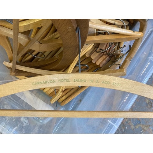 871 - A box containing wooden coat hangers to include some vintage examples