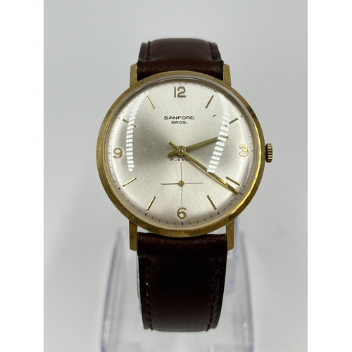 1134A - A 1966 14ct gold cased mechanical men's wristwatch retailed by Sanford Bros. with ETA cal. P320 move... 