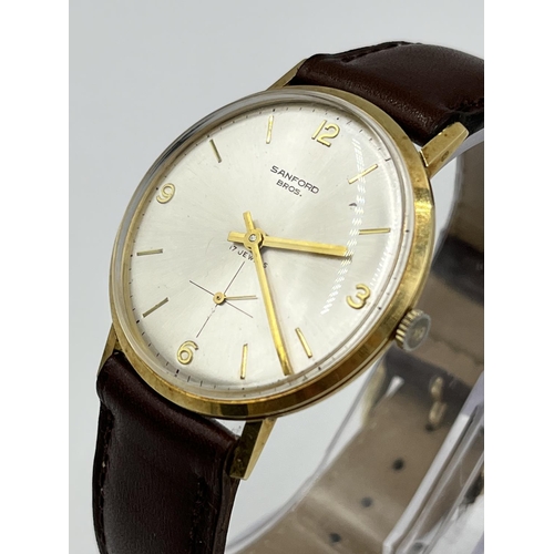 1134A - A 1966 14ct gold cased mechanical men's wristwatch retailed by Sanford Bros. with ETA cal. P320 move... 