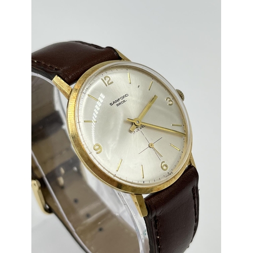 1134A - A 1966 14ct gold cased mechanical men's wristwatch retailed by Sanford Bros. with ETA cal. P320 move... 