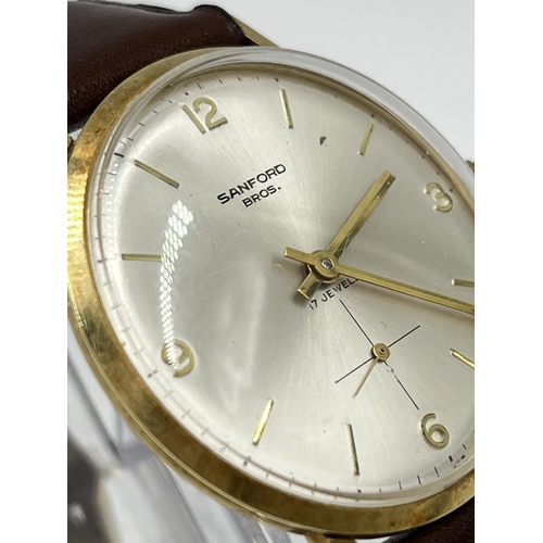 1134A - A 1966 14ct gold cased mechanical men's wristwatch retailed by Sanford Bros. with ETA cal. P320 move... 