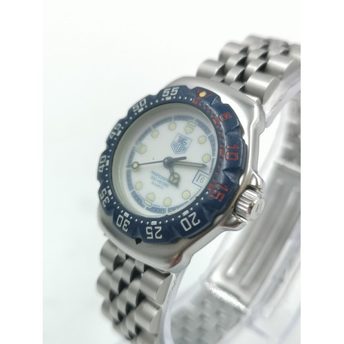 1166 - A vintage boxed and cased Tag Heuer Formula 1 Professional quartz 30mm women's wristwatch with 495/3... 