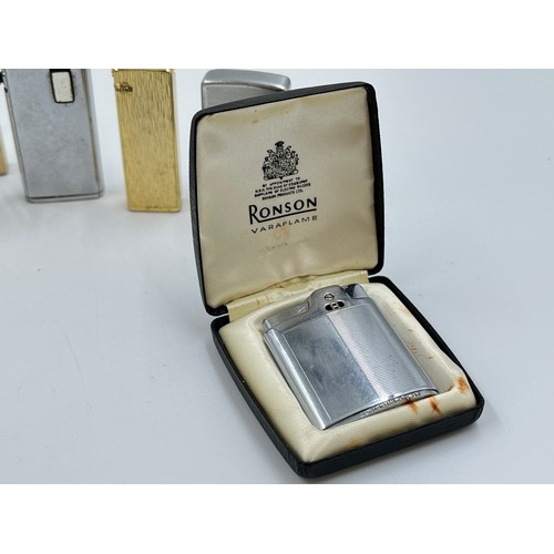 1204A - Thirteen vintage cigarette lighters to include Ronson, Zippo, Colibri etc.