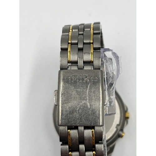 1131A - A Seiko Kinetic Titanium SQ100 men's wristwatch