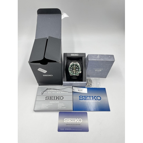 1174 - A boxed Seiko 5 Sports automatic 42mm men's wristwatch with original tags, spare links, guarantee an... 