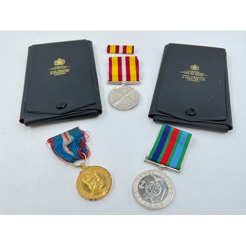 1198B - Three medals, one Voluntary Medical Service presented to G. A. Eastham 21031 May 1987, one UK Armed ... 