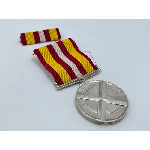 1198B - Three medals, one Voluntary Medical Service presented to G. A. Eastham 21031 May 1987, one UK Armed ... 