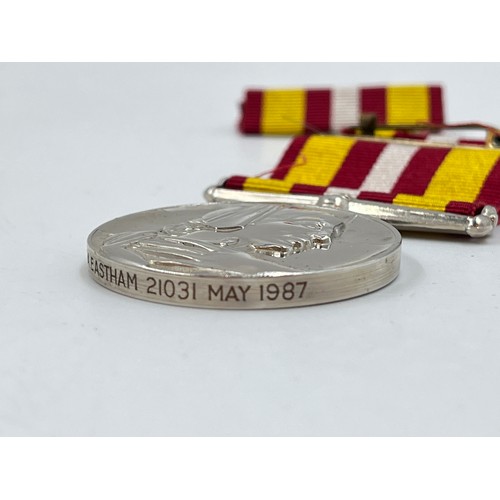 1198B - Three medals, one Voluntary Medical Service presented to G. A. Eastham 21031 May 1987, one UK Armed ... 