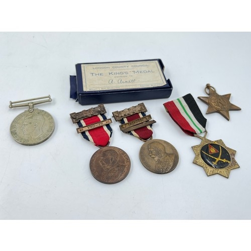 1180 - Five medals, 1911-12 The King's medal presented to A. Arnett, 1912-13 The King's medal presented to ... 