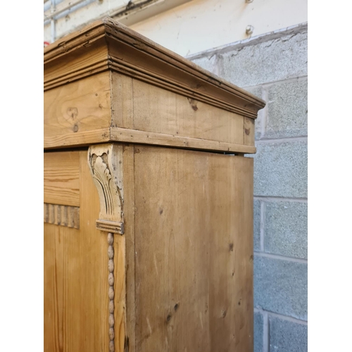 2 - A Victorian style solid pine double wardrobe with lower drawer - approx. 194cm high x 116cm wide x 6... 