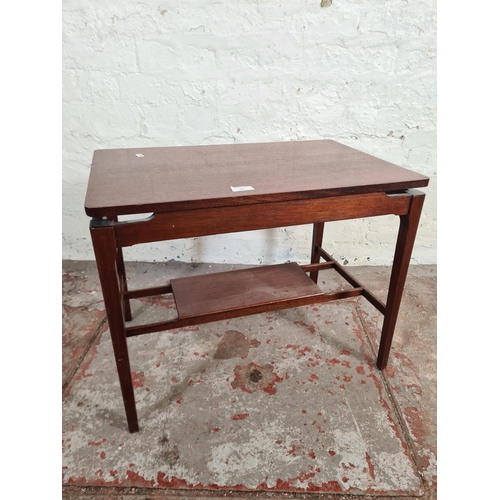 20 - A mid 20th century mahogany rectangular two tier side table - approx. 47cm high x 40cm wide x 60cm l... 