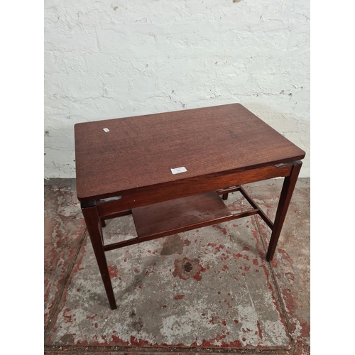 20 - A mid 20th century mahogany rectangular two tier side table - approx. 47cm high x 40cm wide x 60cm l... 