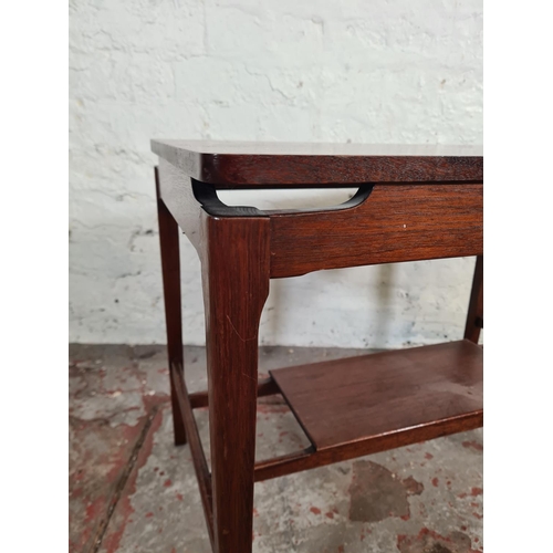 20 - A mid 20th century mahogany rectangular two tier side table - approx. 47cm high x 40cm wide x 60cm l... 