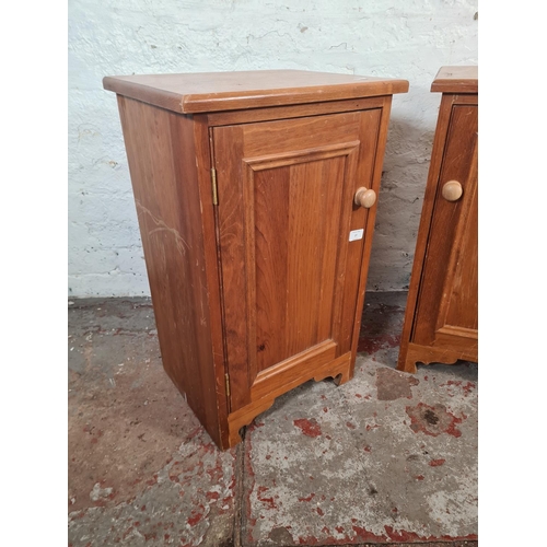 27 - A pair of modern pine bedside cabinets - approx. 69cm high x 42cm wide x 33cm deep