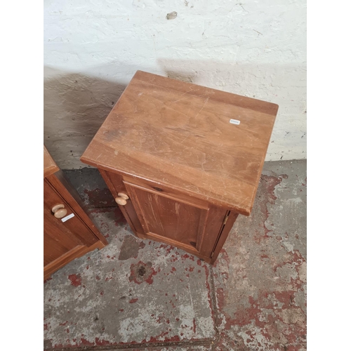 27 - A pair of modern pine bedside cabinets - approx. 69cm high x 42cm wide x 33cm deep