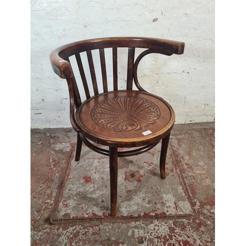 34 - A Thonet style bentwood armchair - approx. 75cm high x 52cm wide x 49cm deep