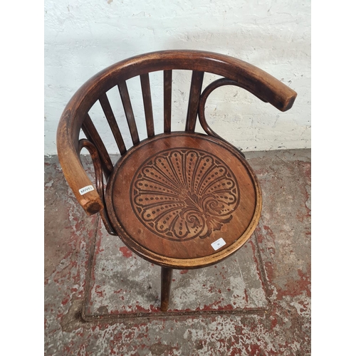 34 - A Thonet style bentwood armchair - approx. 75cm high x 52cm wide x 49cm deep