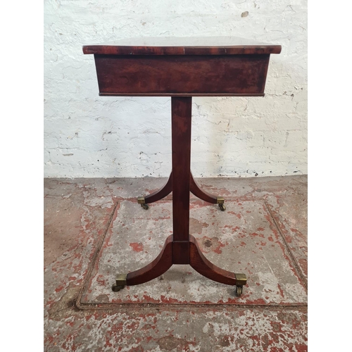 35 - A Regency mahogany rectangular side table with single drawer, lower stretcher and four brass castors... 