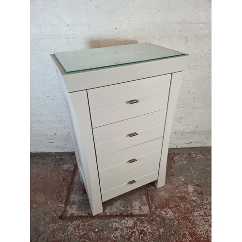 43 - A modern grey painted chest of four drawers with glass top - approx. 120cm high x 75cm wide x 47cm d... 