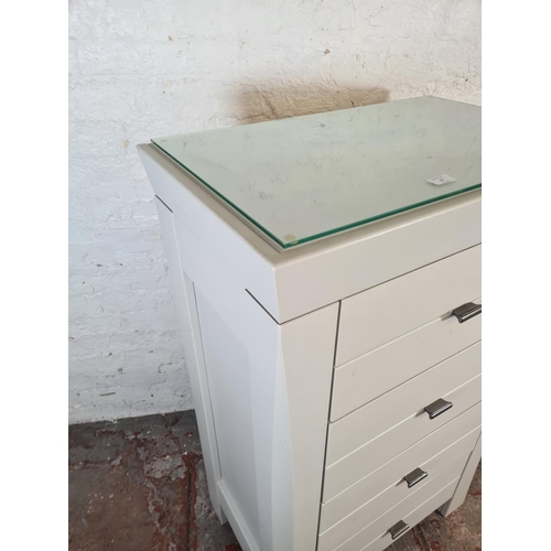 43 - A modern grey painted chest of four drawers with glass top - approx. 120cm high x 75cm wide x 47cm d... 