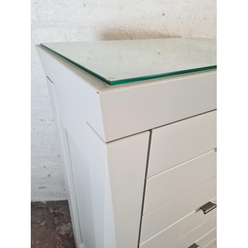 44 - A modern grey painted chest of four drawers with glass top - approx. 120cm high x 75cm wide x 47cm d... 